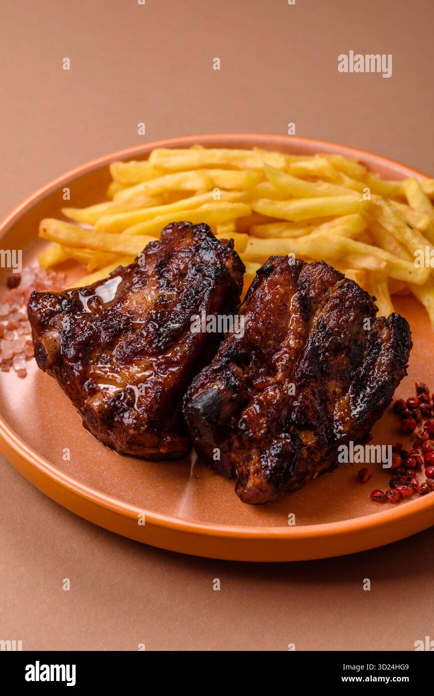 Grilled or barbecued pork ribs with sauce. Grilled ribs Stock Photo