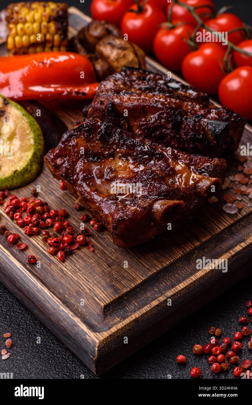 Grilled or barbecued pork ribs with sauce. Grilled ribs Stock Photo