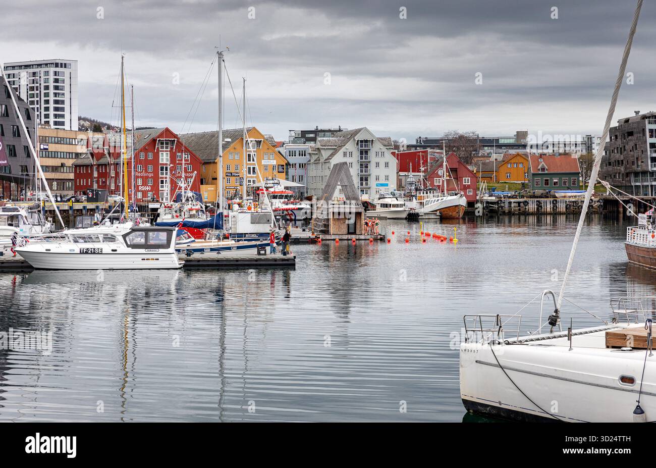 Tromso harbor at cloudy day Stock Photo
