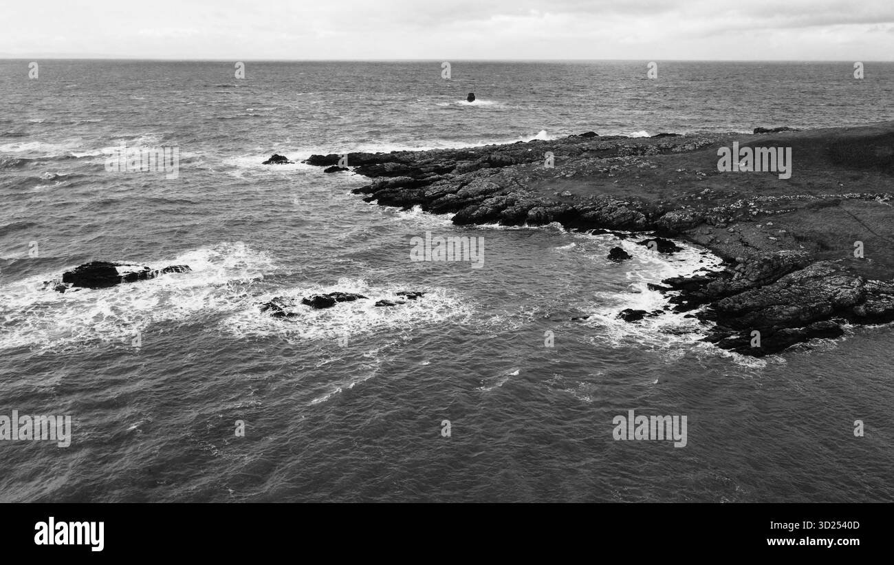 Black and white aerial view of rugged coastline Stock Photo - Alamy