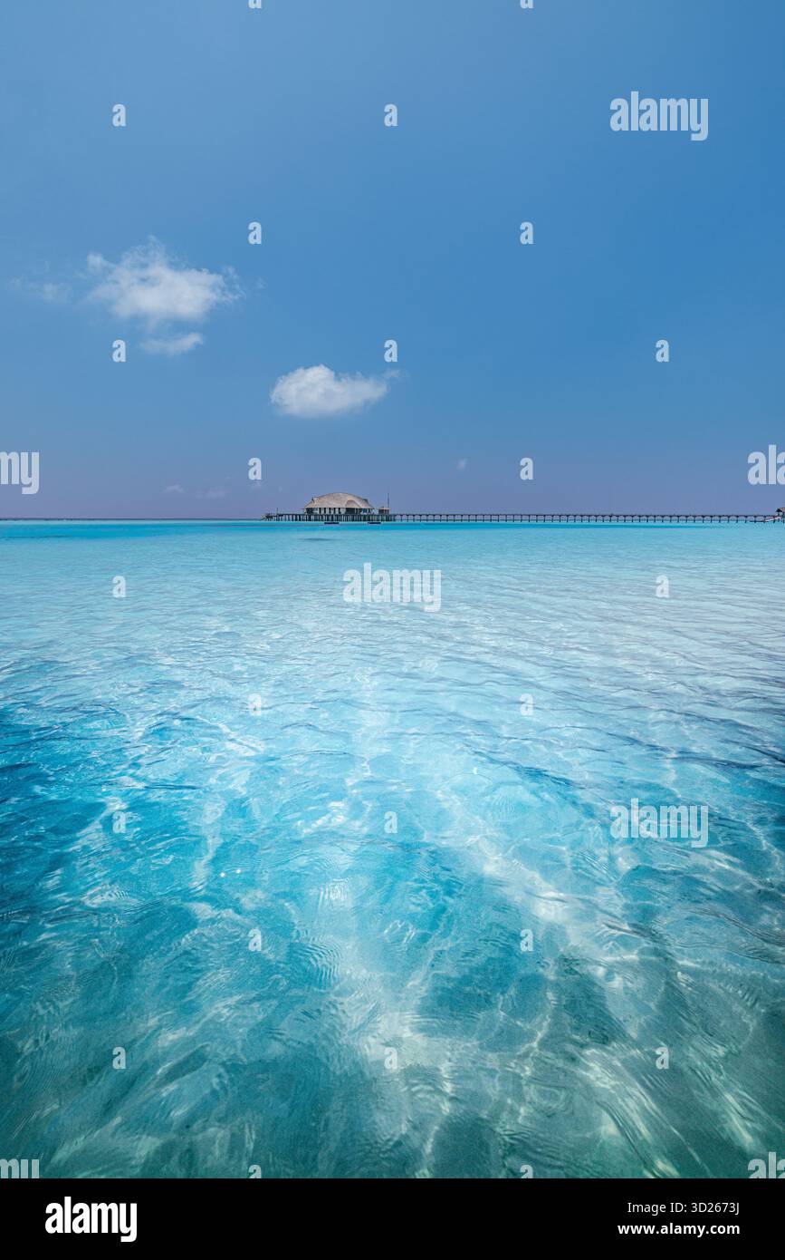 Pristine ocean view with water villas in Maldives luxury tropical island summer travel scenery Stock Photo