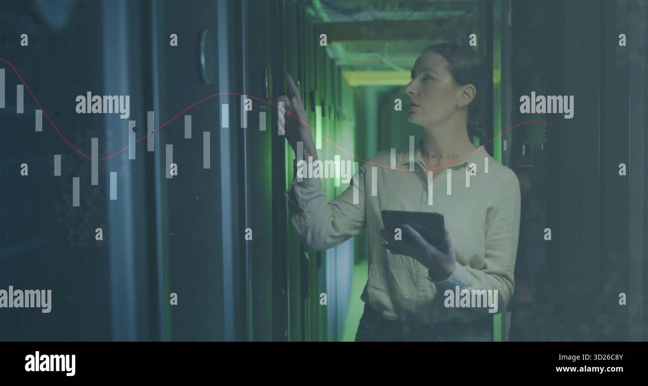 Holding technician pressing server rack in server room with tablet and data charts, copy space Stock Photo