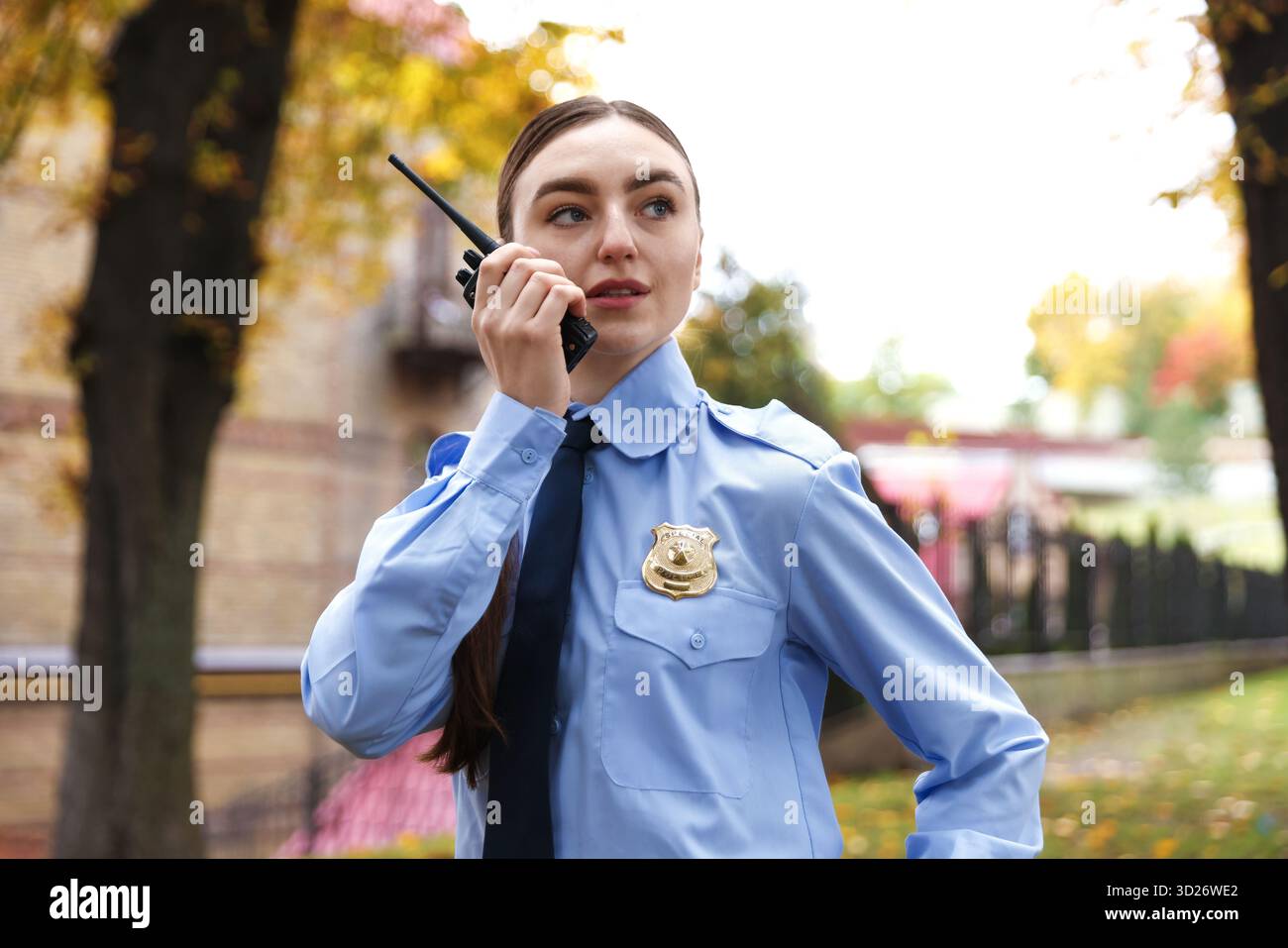 Police officer radio in park hi-res stock photography and images - Alamy