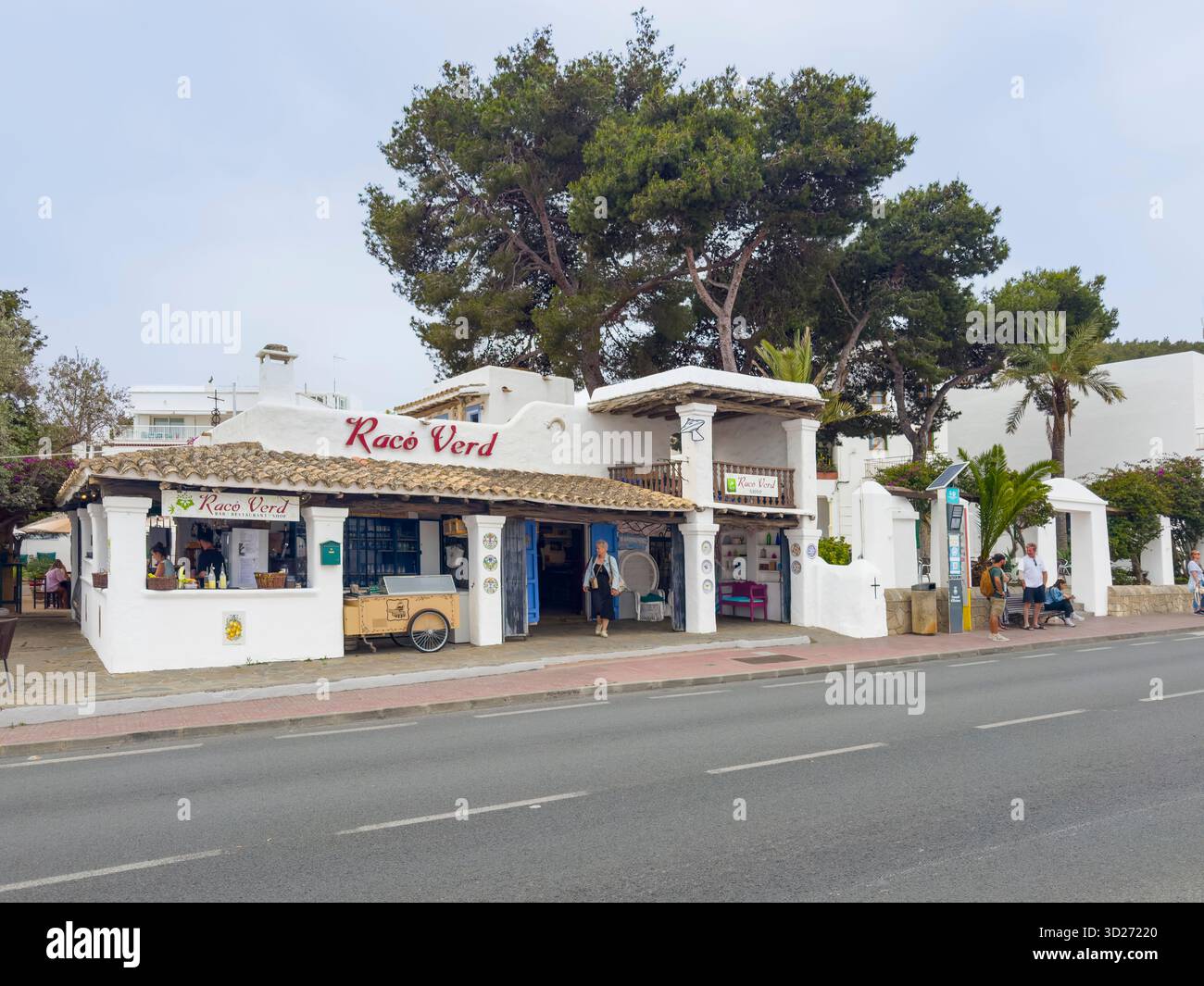 Carrer de Pere Escanellas lined with shops, restaurants and bars in the centre of Sant Josep de sa Talaia, Ibiza, Spain: Phillip Roberts - Smartphone Captured Stock Image