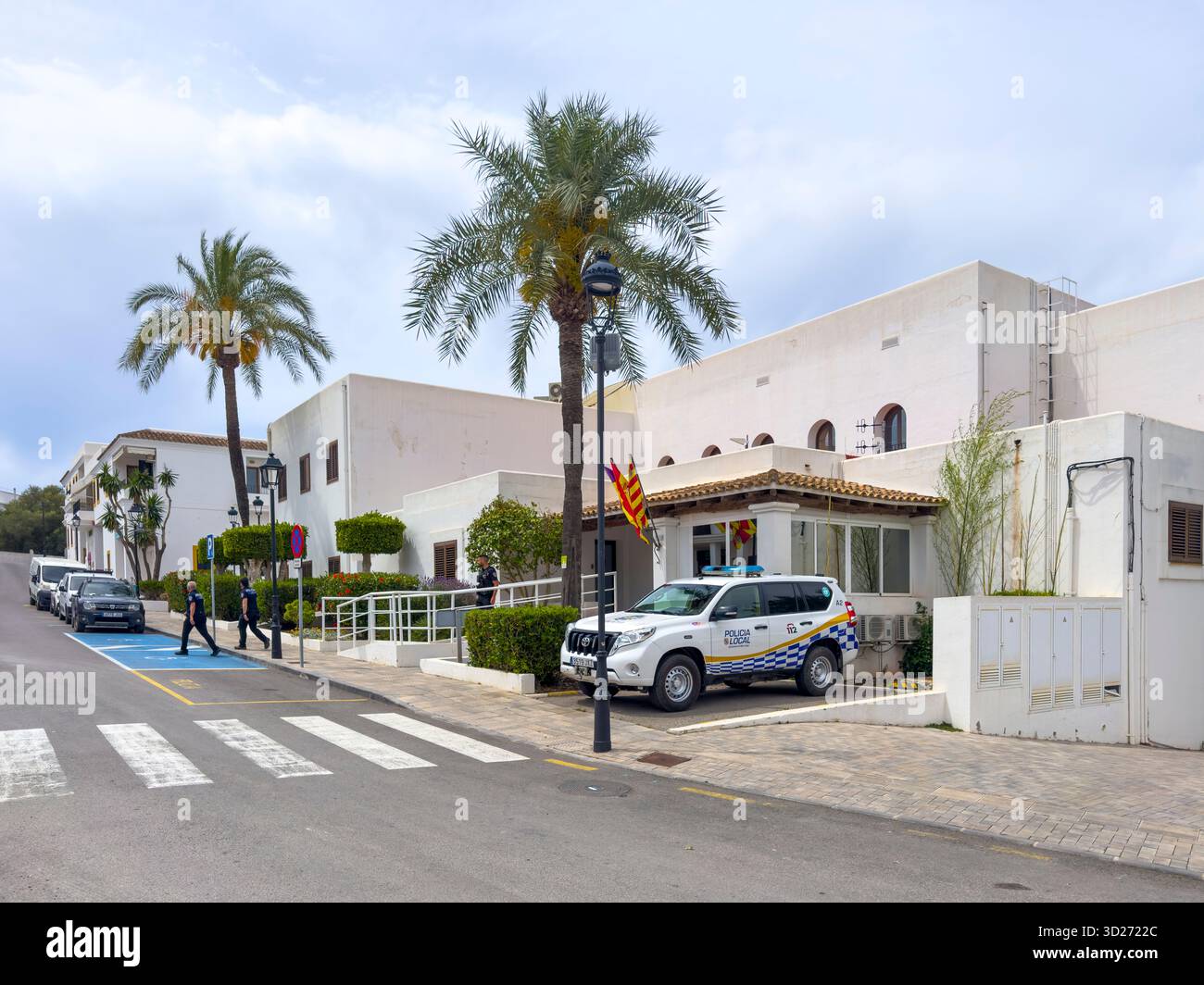 Carrer de Pere Escanellas lined with shops, restaurants and bars in the centre of Sant Josep de sa Talaia, Ibiza, Spain: Phillip Roberts - Smartphone Captured Stock Image