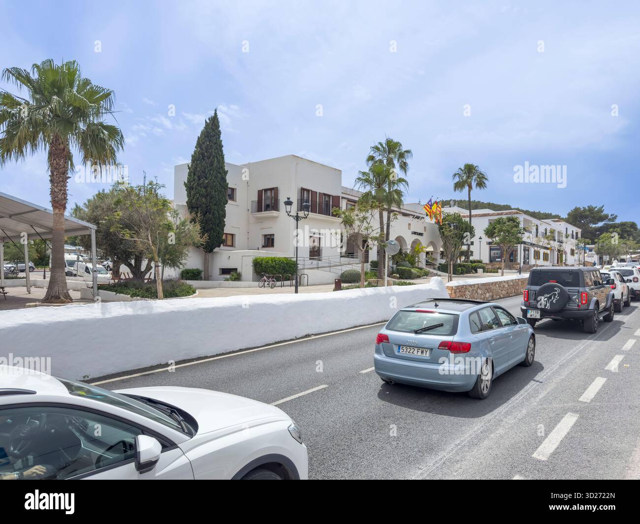 Carrer de Pere Escanellas lined with shops, restaurants and bars in the centre of Sant Josep de sa Talaia, Ibiza, Spain: Phillip Roberts - Smartphone Captured Stock Image