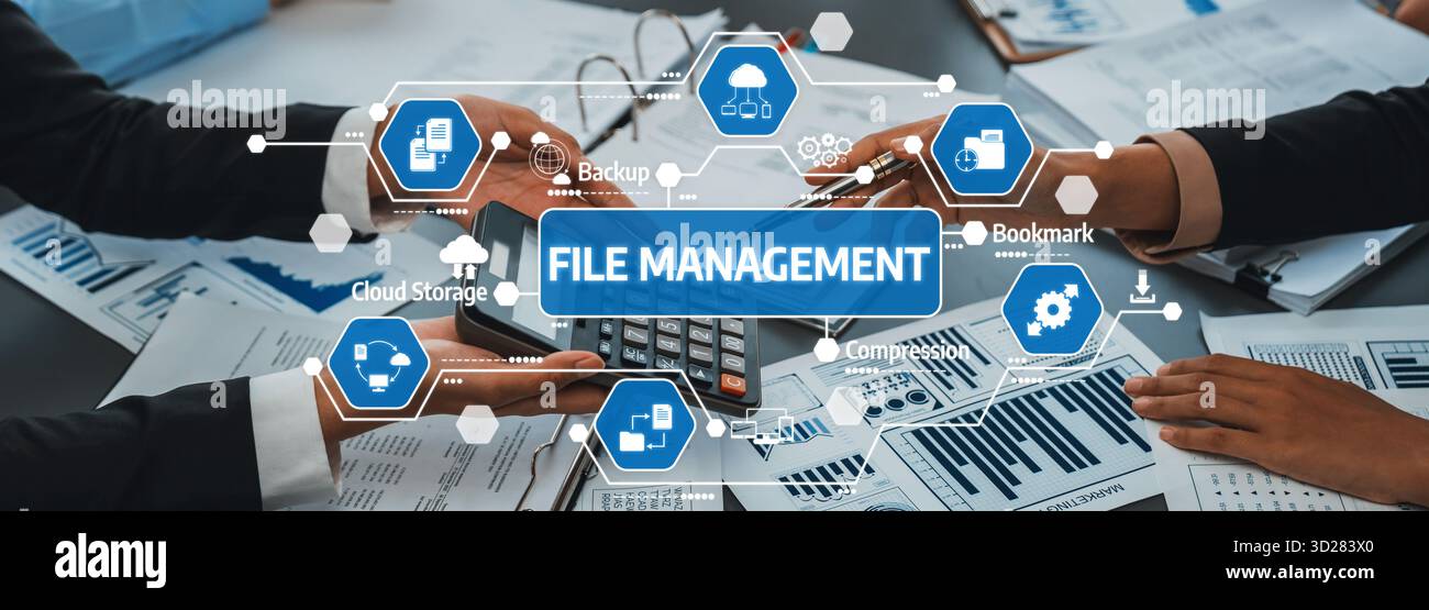 This image showcases file management practices in a modern office setting, highlighting collaboration through technology and efficient processes for e Stock Photo