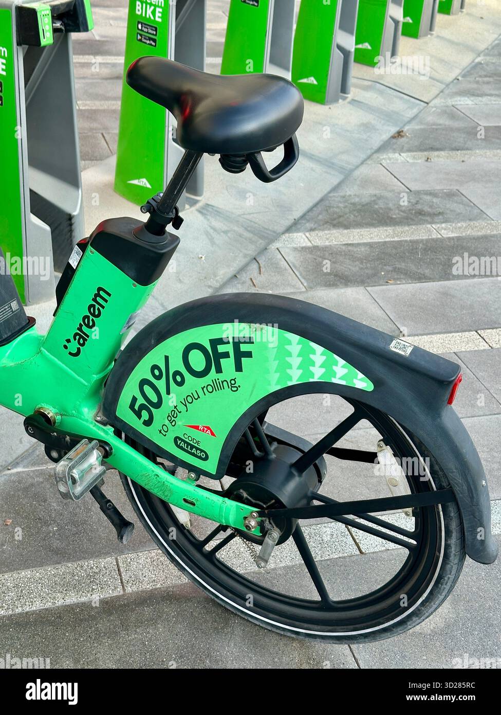Green Careem Rental Bikes Dubai - Smartphone Captured Stock Image