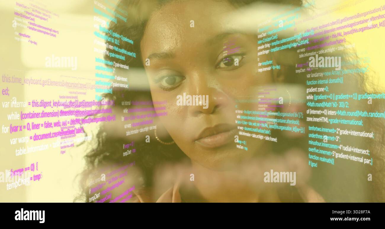 Analyzing software developer reviewing transparent display in tech office, with multicolored code Stock Photo