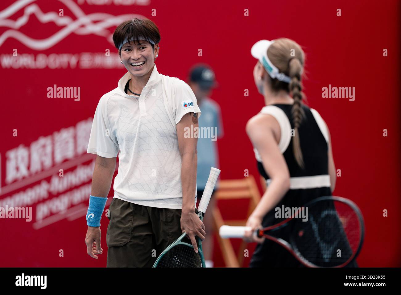 Momoko Kobori of Japan and Peangtarn Plipuech of Thailand play against Kamilla Rakhimova and Aliaksandra Sasnovich of Russiaduring WTA250 Prudential Hong Kong Open 2025 in Victoria Park, Hong Kong Stock Photo