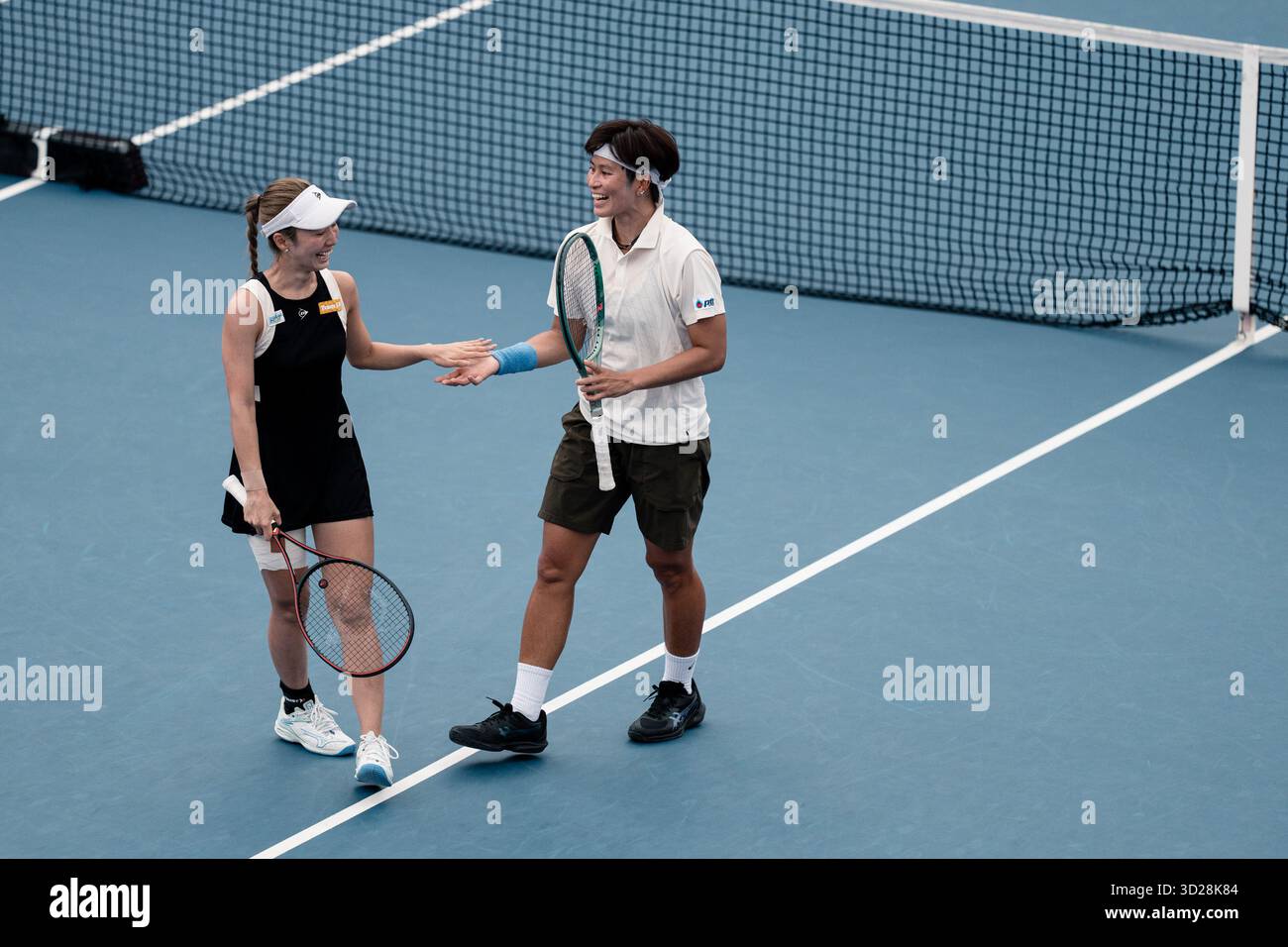 Momoko Kobori of Japan and Peangtarn Plipuech of Thailand play against Kamilla Rakhimova and Aliaksandra Sasnovich of Russiaduring WTA250 Prudential Hong Kong Open 2025 in Victoria Park, Hong Kong Stock Photo