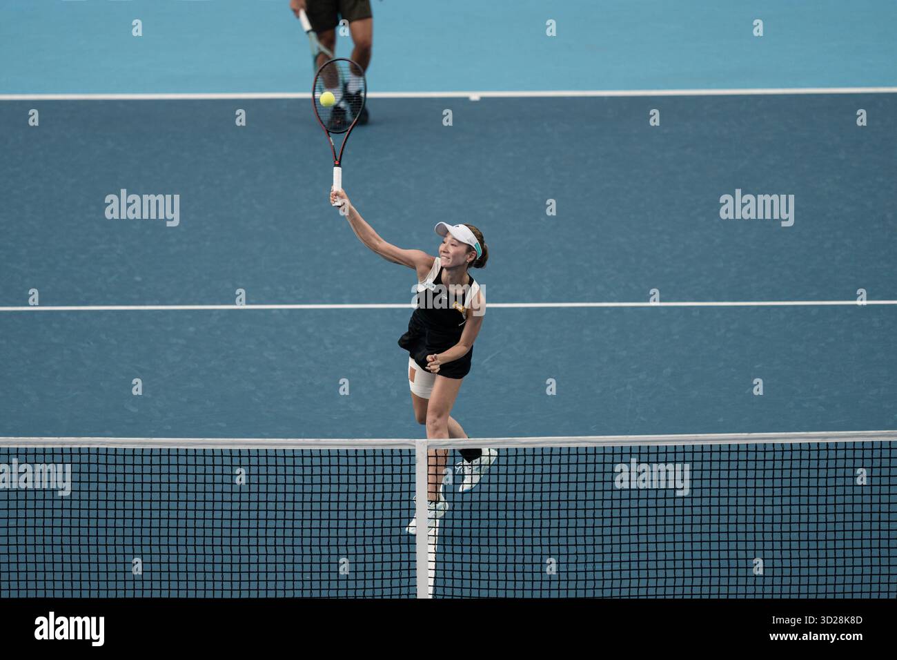 Momoko Kobori of Japan and Peangtarn Plipuech of Thailand play against Kamilla Rakhimova and Aliaksandra Sasnovich of Russiaduring WTA250 Prudential Hong Kong Open 2025 in Victoria Park, Hong Kong Stock Photo
