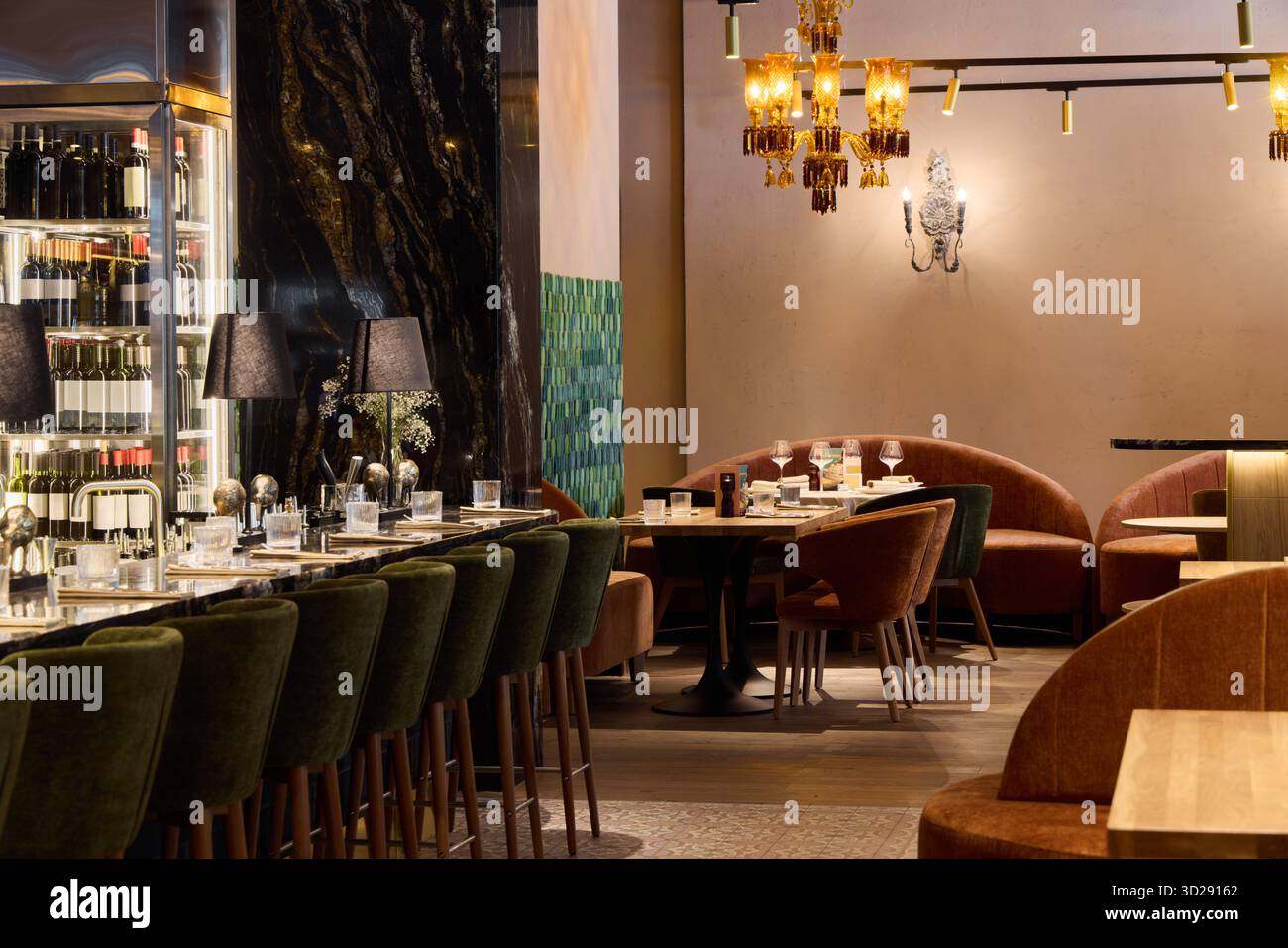 Elegant restaurant interior with cozy seating and warm lighting Stock ...