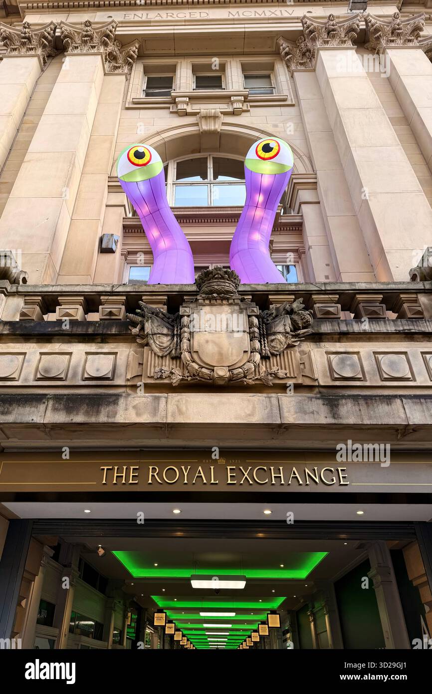 The Royal Exchange in St Anne’s Square, Manchester City Centre. Inflatable monster eyes outside shopping centre for Halloween - Smartphone Captured Stock Image