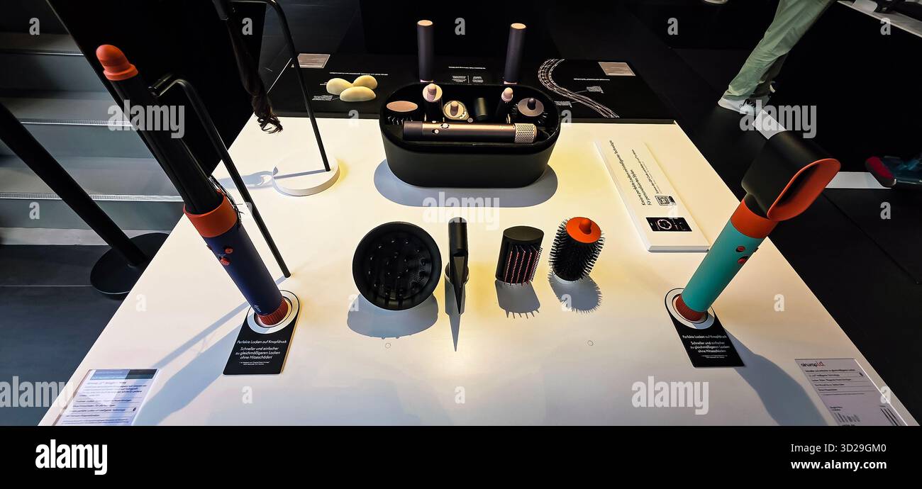 Berlin, Germany - June 17, 2025: Innovative hair styling tools are arranged on a sleek table in a contemporary salon. - Smartphone Captured Stock Image