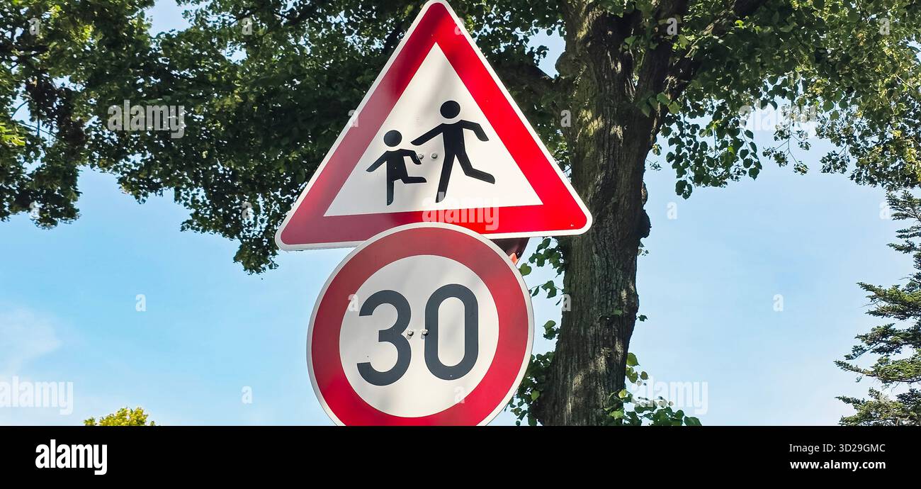 Berlin, Germany - June 17, 2025: Pedestrian crossing sign indicates safety for children in urban environment. - Smartphone Captured Stock Image