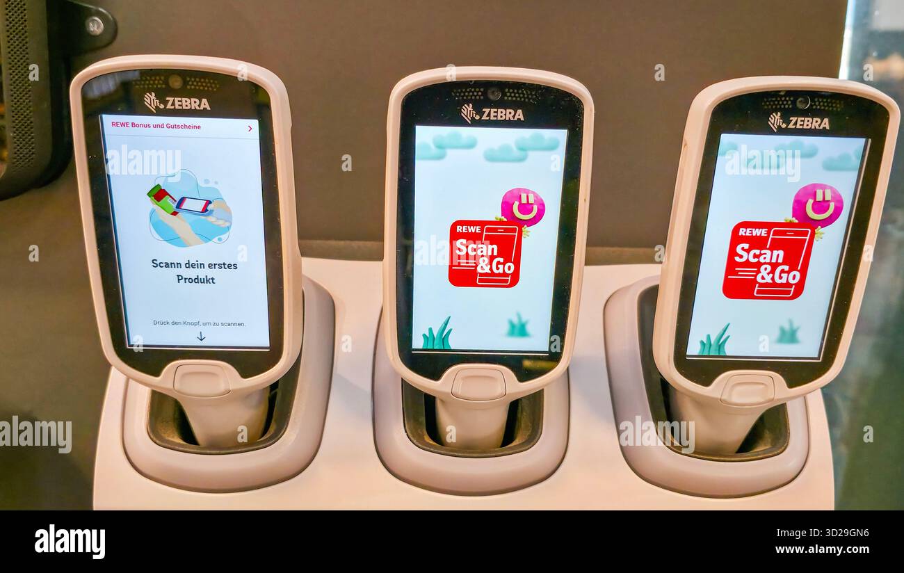 Berlin, Germany - July 04, 2025: Zebra Scan & Go devices are displayed in a retail store for customer use and convenience. - Smartphone Captured Stock Image