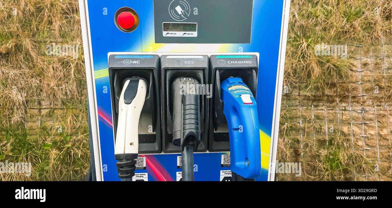 Berlin, Germany - June 07, 2025: Electric vehicle charging station features multiple connectors for various eco-friendly cars. - Smartphone Captured Stock Image
