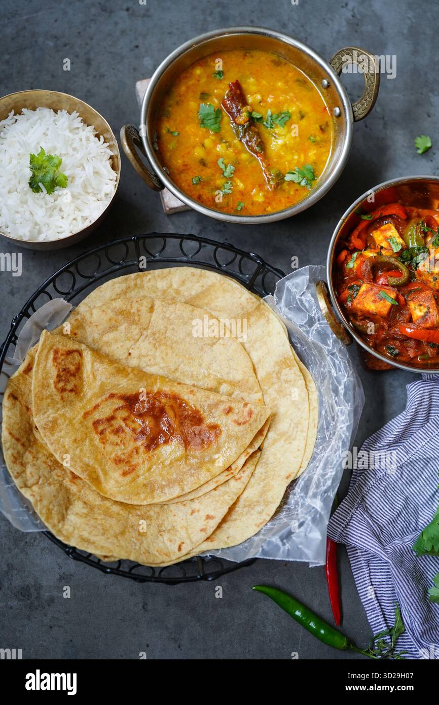 Indian vegetarian meal - Roti served with dal tadka paneer jalfrezi and ...
