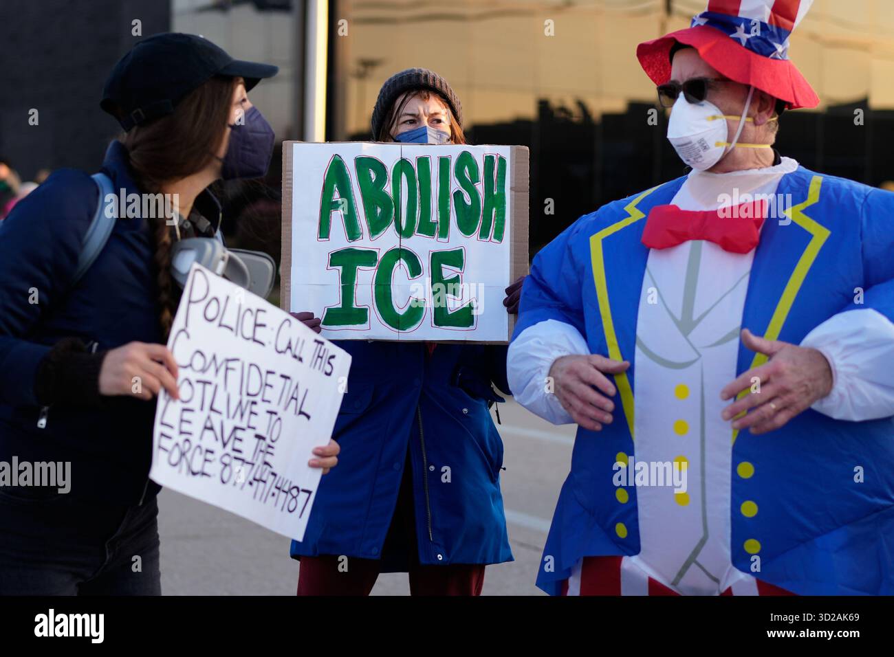 Protesters gather outside an ICE processing facility in the Chicago ...