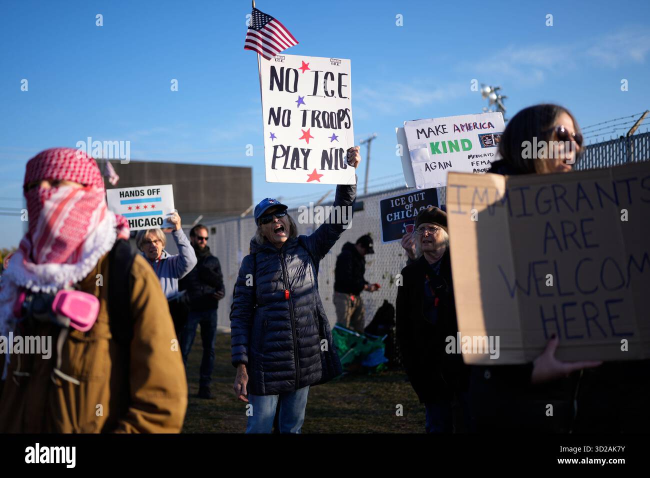 Protesters gather outside an ICE processing facility in the Chicago ...