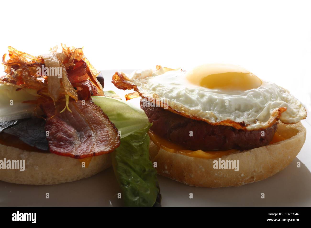 Juicy Hamburger with Fresh Ingredients Close Up Stock Photo