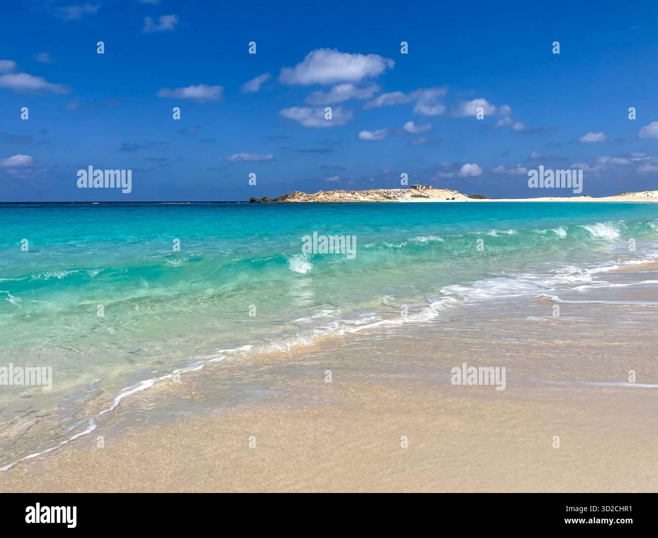 The turquoise blue waters of Egypt's North Coast, at a resort beach near Ras Al Hikma in Matrouh Governorate - Smartphone Captured Stock Image