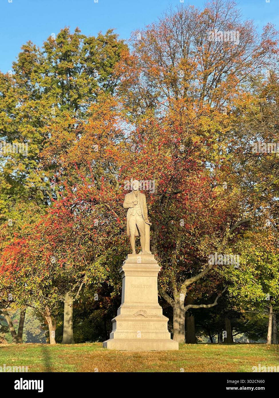 The Alexander Hamilton Statue stands in Central Park, a tribute to the visionary statesman and architect of the U.S. financial system. - Smartphone Captured Stock Image