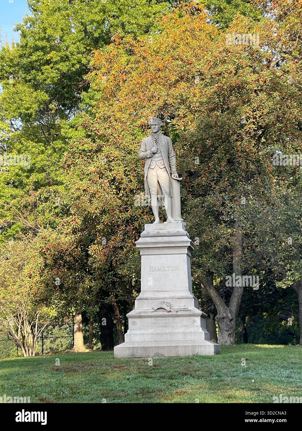 The Alexander Hamilton Statue stands in Central Park, a tribute to the visionary statesman and architect of the U.S. financial system. - Smartphone Captured Stock Image