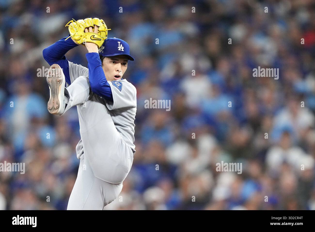Los Angeles Dodgers pitcher Roki Sasaki (11) winds up to deliver ...