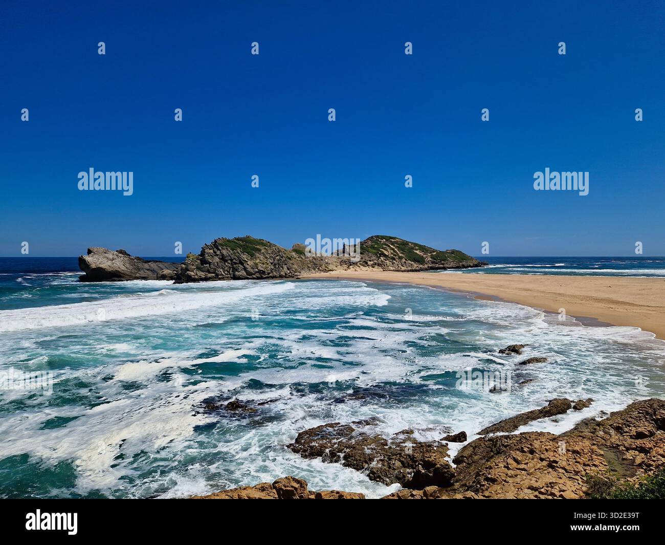 Sunny day at the tombolo beach of Robberg Nature Reserve, South Africa - Smartphone Captured Stock Image