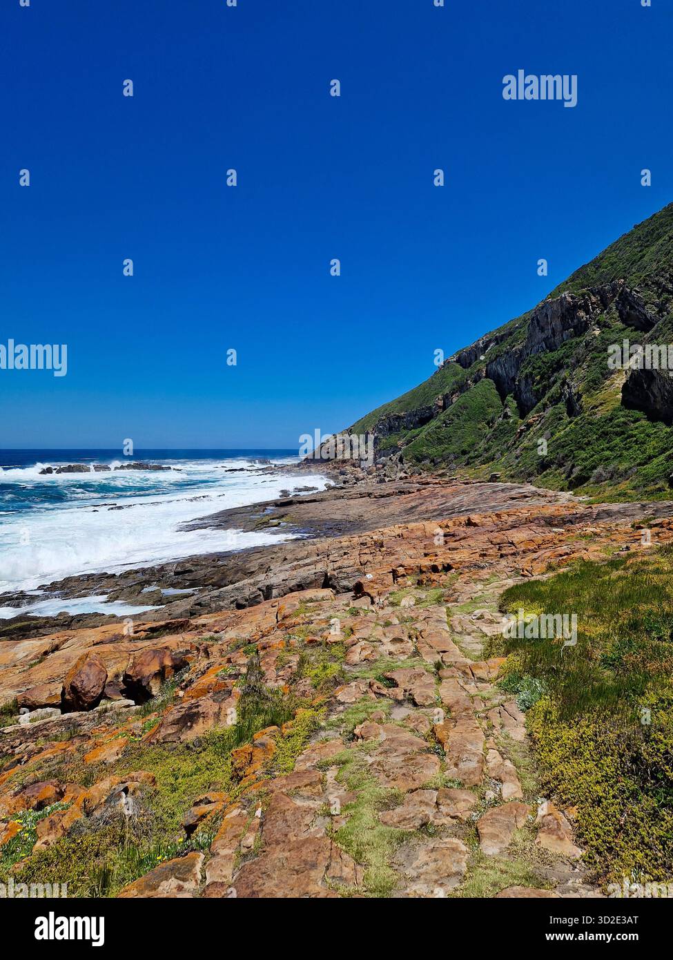 Scenic view of the rocky coastline at Robberg Nature Reserve, South Africa. - Smartphone Captured Stock Image