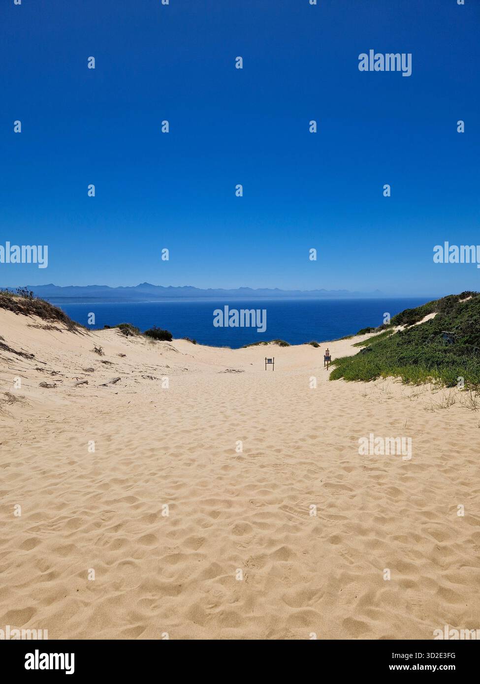 Pristine sand dunes and distant mountains, Robberg Nature Reserve, South Africa. - Smartphone Captured Stock Image