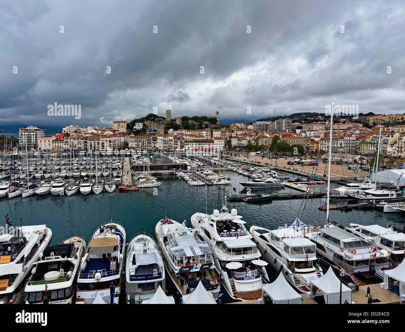Cannes harbor with luxury yachts during MIPIM, France - Smartphone Captured Stock Image