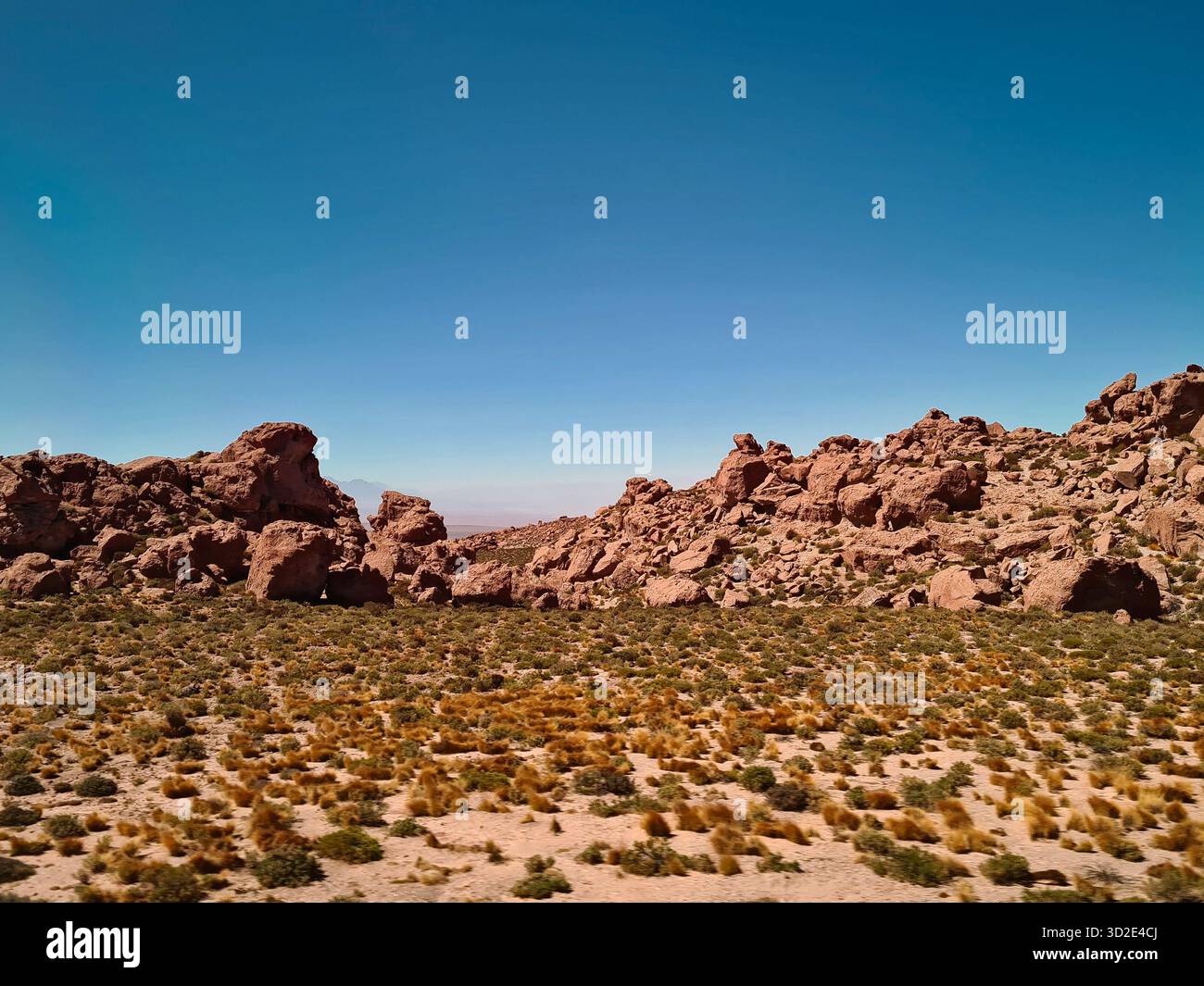 Red rock formations in the arid Atacama Desert, Chile - Smartphone Captured Stock Image