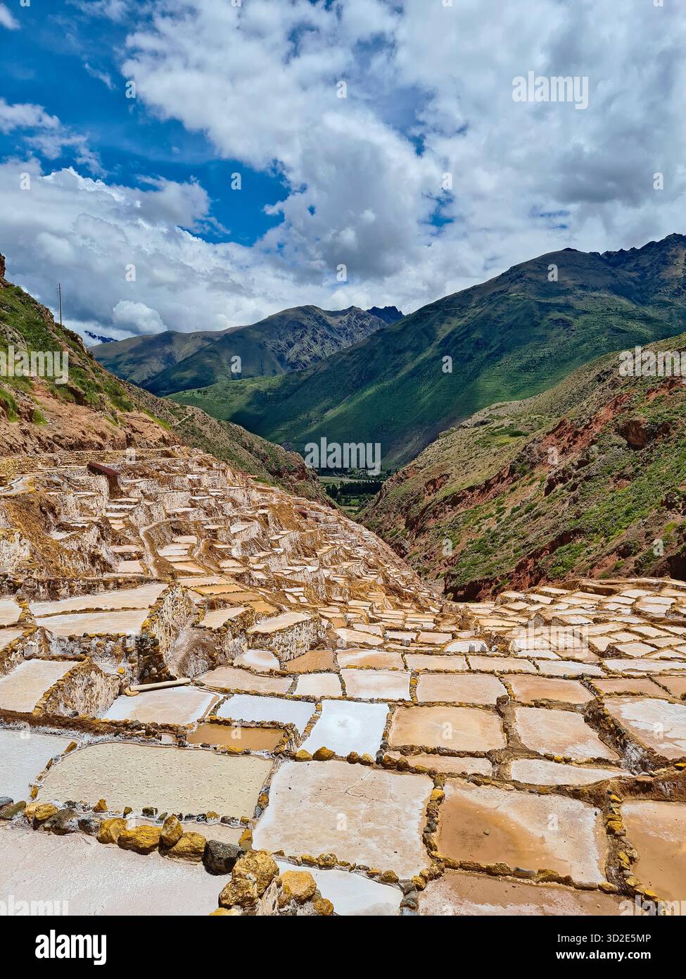 Traditional salt production at the Maras salt ponds, Cusco, Peru - Smartphone Captured Stock Image