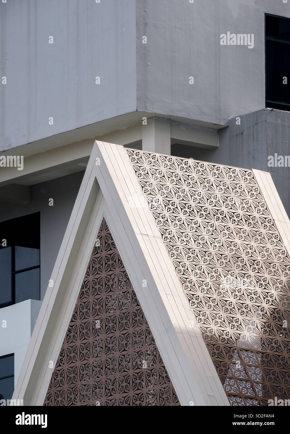 Triangle Building Small Modern exterior building with triangle shape Stock Photo - Alamy