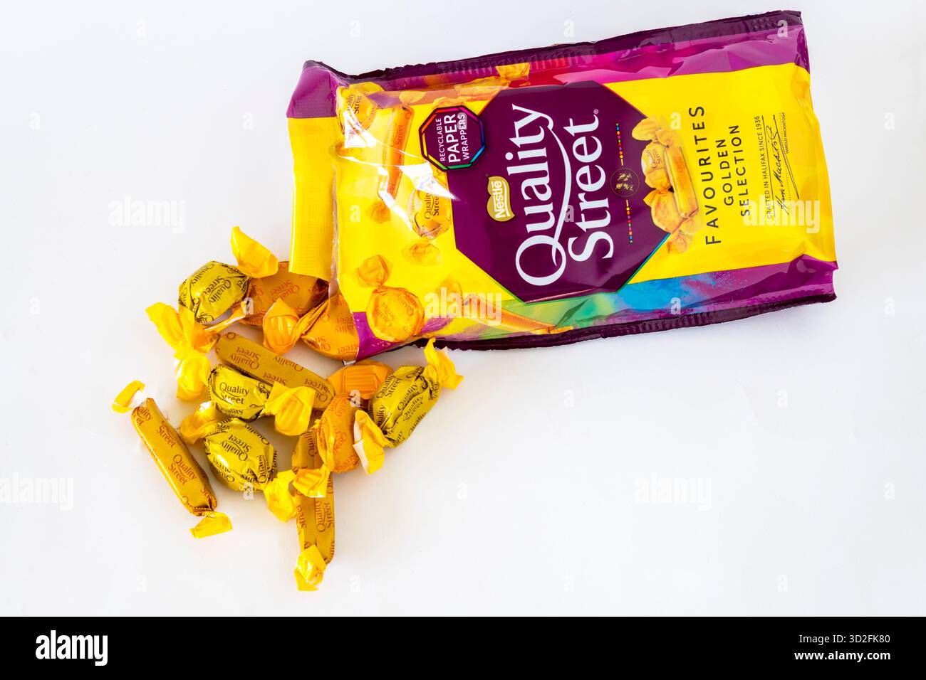 A packet of Quality Street Favourites Golden Selection.  Contains Toffee Fingers, Toffee Pennies and Caramel Swirls. Stock Photo