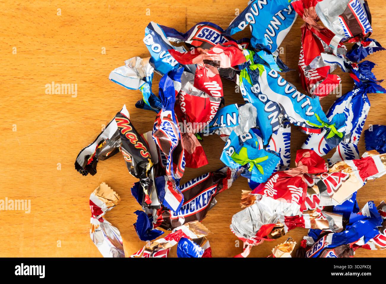 Empty wrappers from a selection of Celebrations mini chocolate bars ...