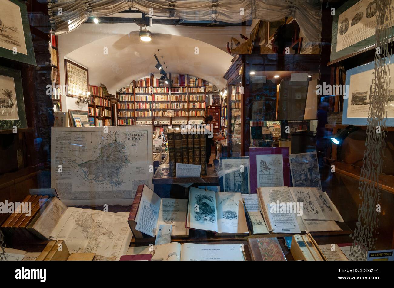 View from the outside of the Colonnese bookshop window on Via dei Tribunali, Naples' historic center. Stock Photo
