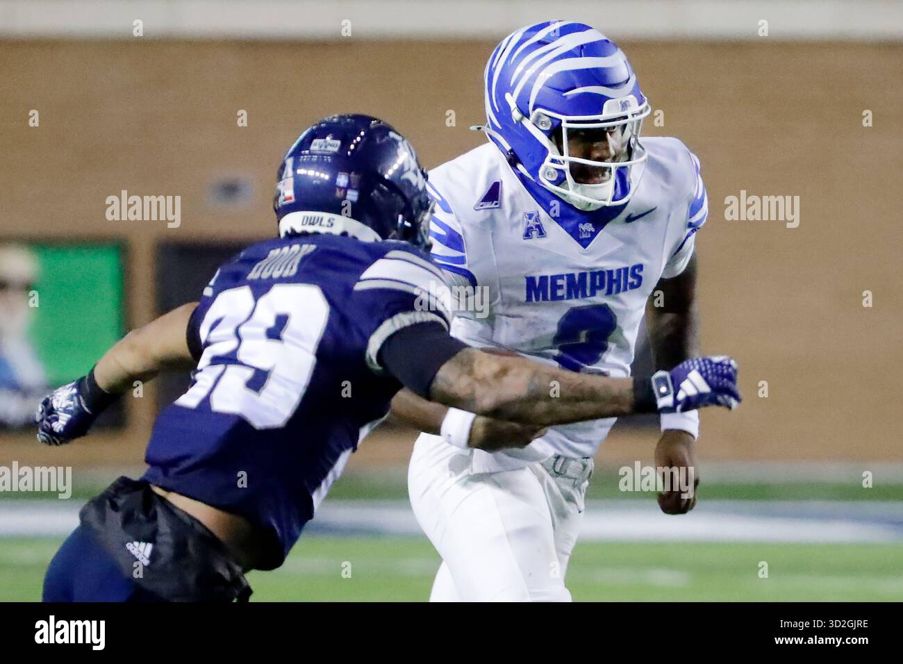 Rice safety Daveon Hook (29) closes on to tackle Memphis quarterback ...