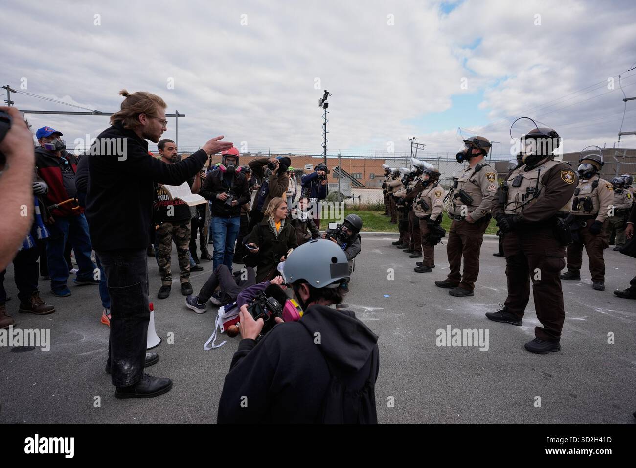 Protesters gather outside an ICE processing facility in the Chicago ...