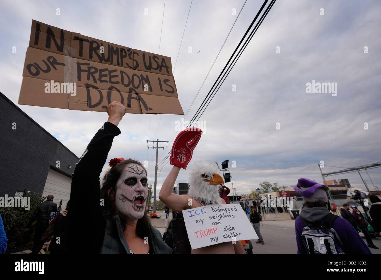 Protesters gather outside an ICE processing facility in the Chicago ...