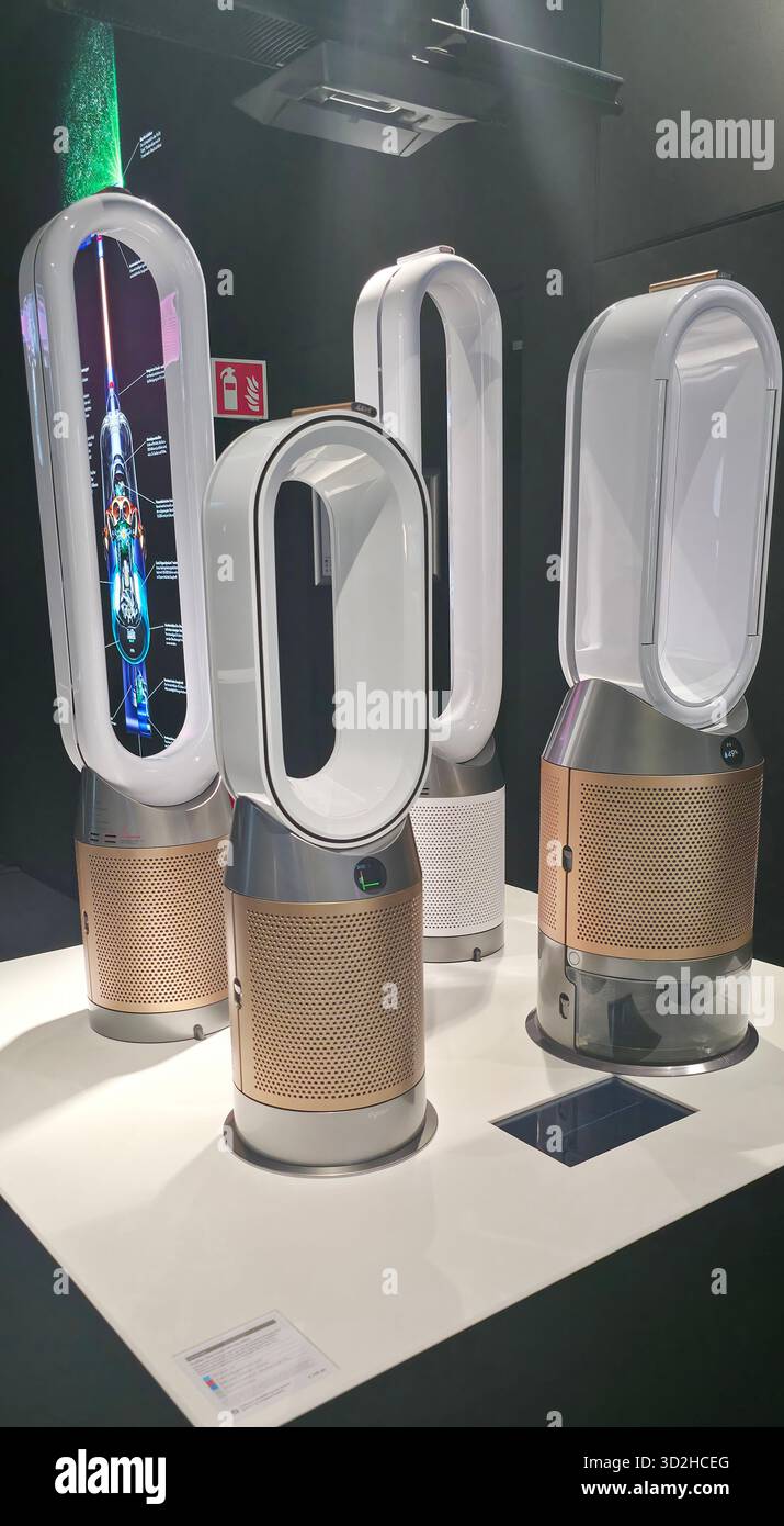 Berlin, Germany - June 17, 2025: Modern Dyson air purifiers showcased in a sleek showroom setting with clean design. - Smartphone Captured Stock Image