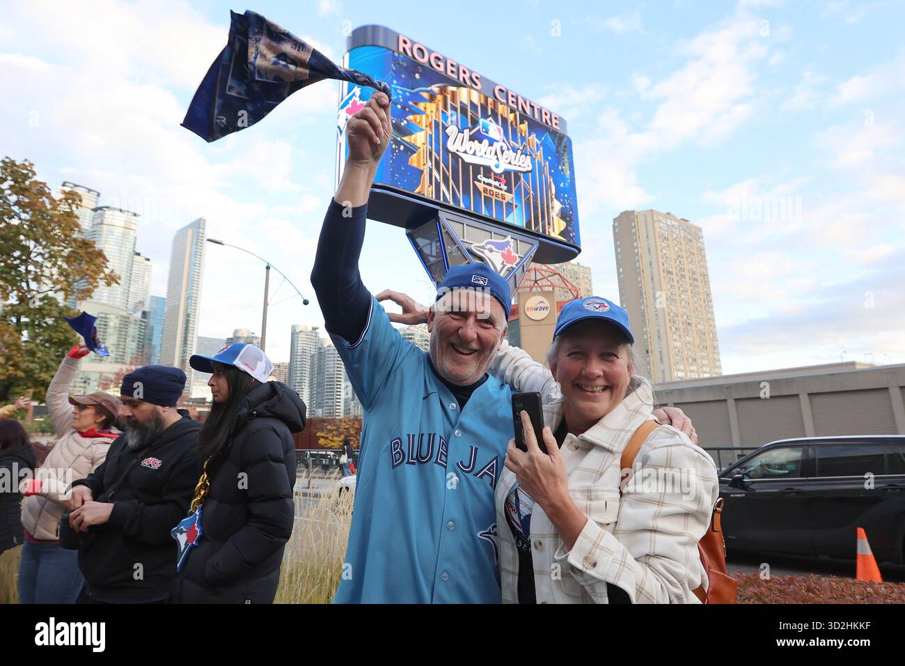 Fans cheer outside the Rogers Centre before the start of game seven of ...