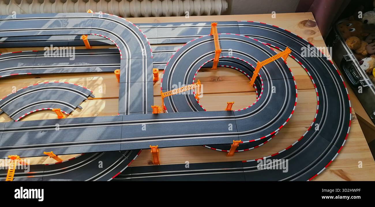 Partial view of a private slot car track with elevated bridge sections ...