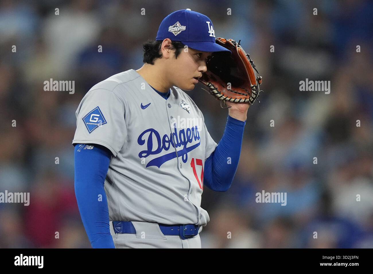 Pitchcom Device Los Angeles Dodgers pitcher Shohei Ohtani listens to his PitchCom ...