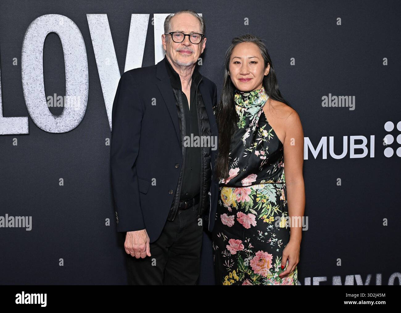 Steve Buscemi, left, and Karen Ho attend the premiere of "Die My Love