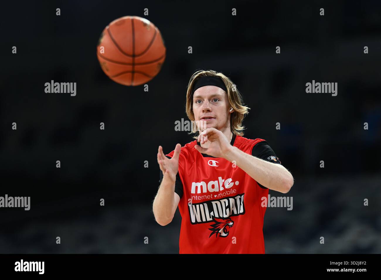 Nic Rillie Jaron Rillie of the Wildcats warms up ahead of the NBL Round 7 match ...