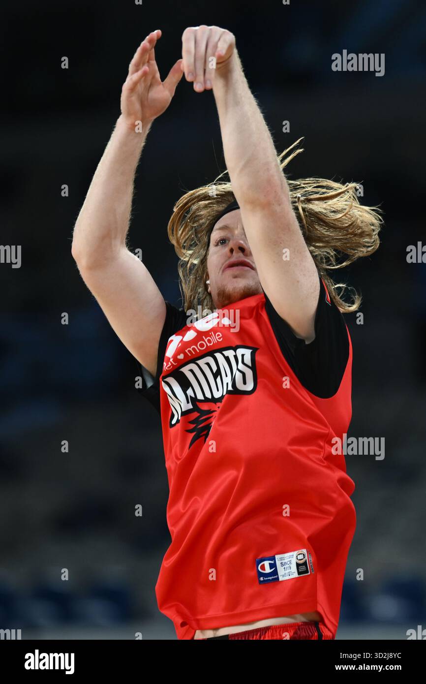 Nic Rillie Jaron Rillie of the Wildcats warms up ahead of the NBL Round 7 match ...